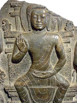 Buddha sculpture seated in European fashion